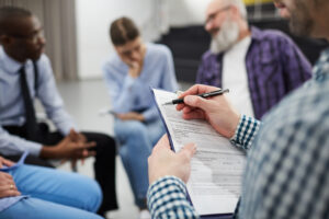 Closeup of Psychologist in Support Group